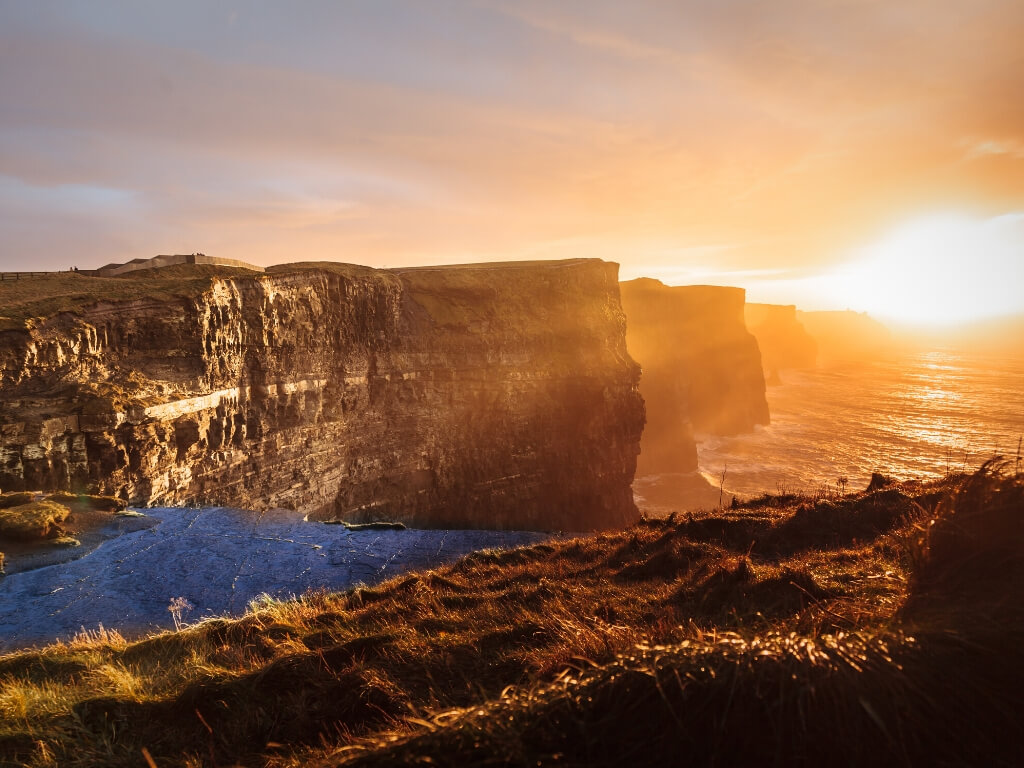 A sunset picture of the Cliffs of Moher in Ireland