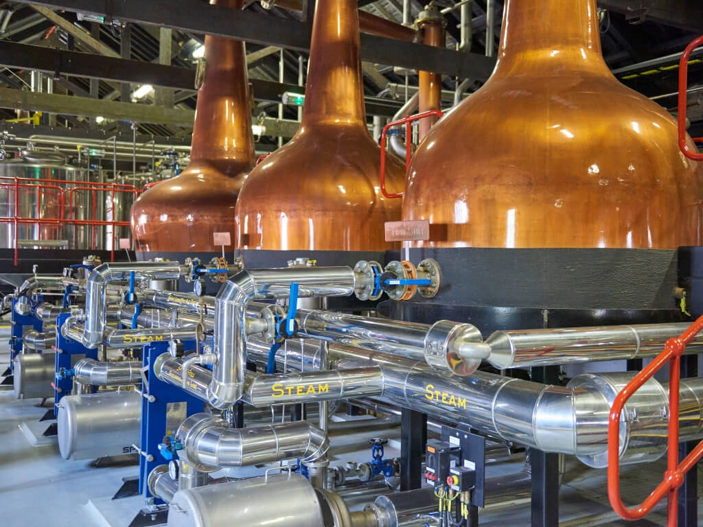 A picture of three stills in the Jameson Distillery in Midleton, Cork, Ireland