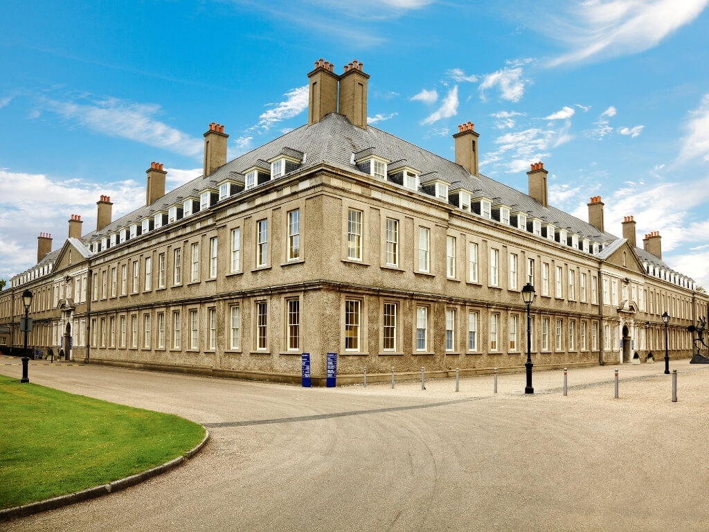 A picture of the Royal Hospital Kilmainham in Dublin with blue skies above it