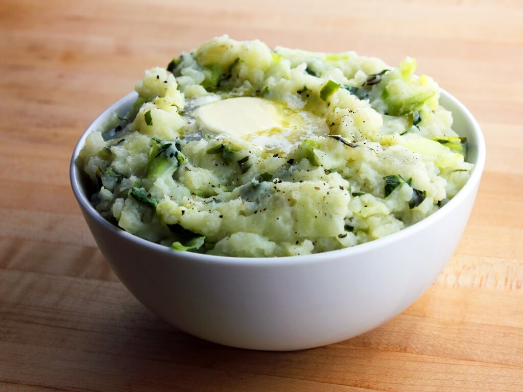 A picture of a bowl of Irish colcannon mashed potatoes