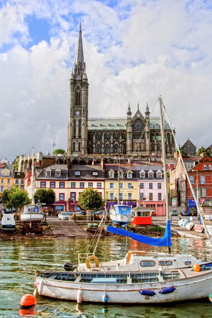 A picture of the harbour at Cobh, Cork with the cathedral on the hill in the background