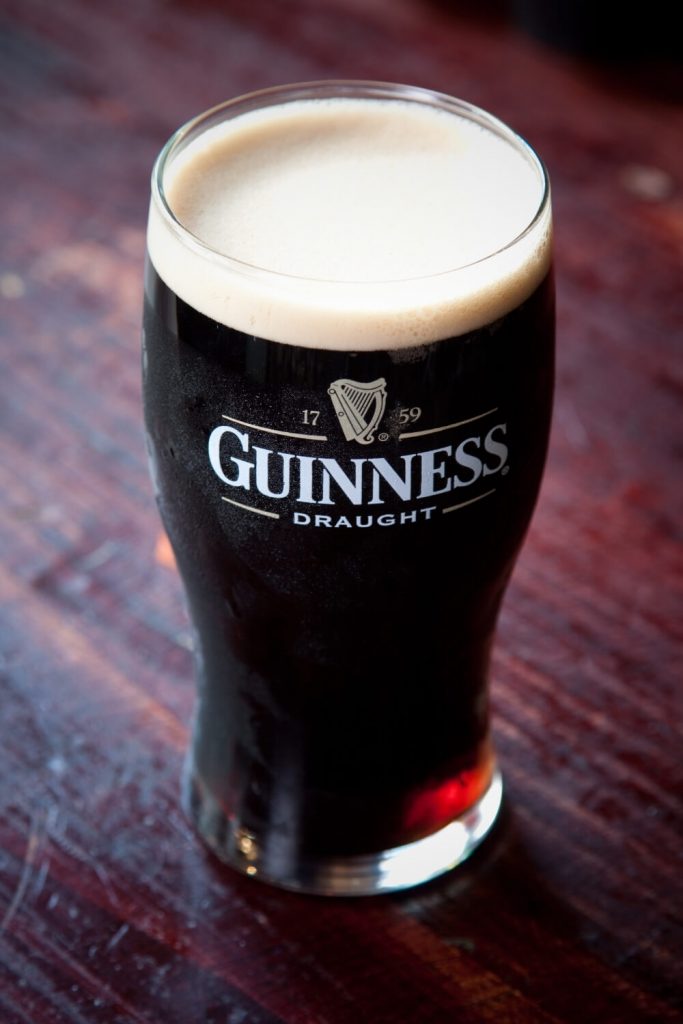 A picture of a poured and settled pint of Guinness