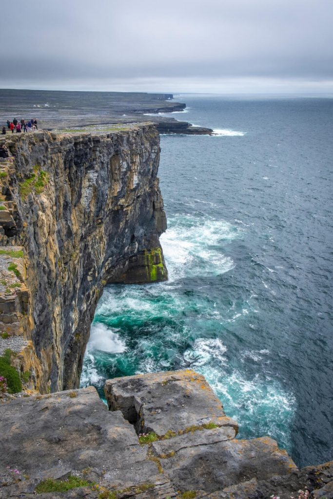 A picture of the sheer cliffs at Dun Aonghasa on Inishmor, the biggest of the Aran Islands