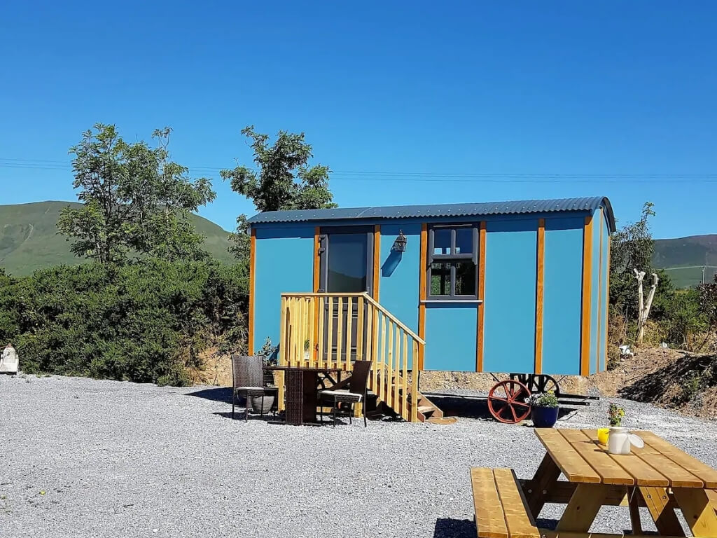 A picture of the blue shepherd's hut at Dingle Way Glamping, Kerry