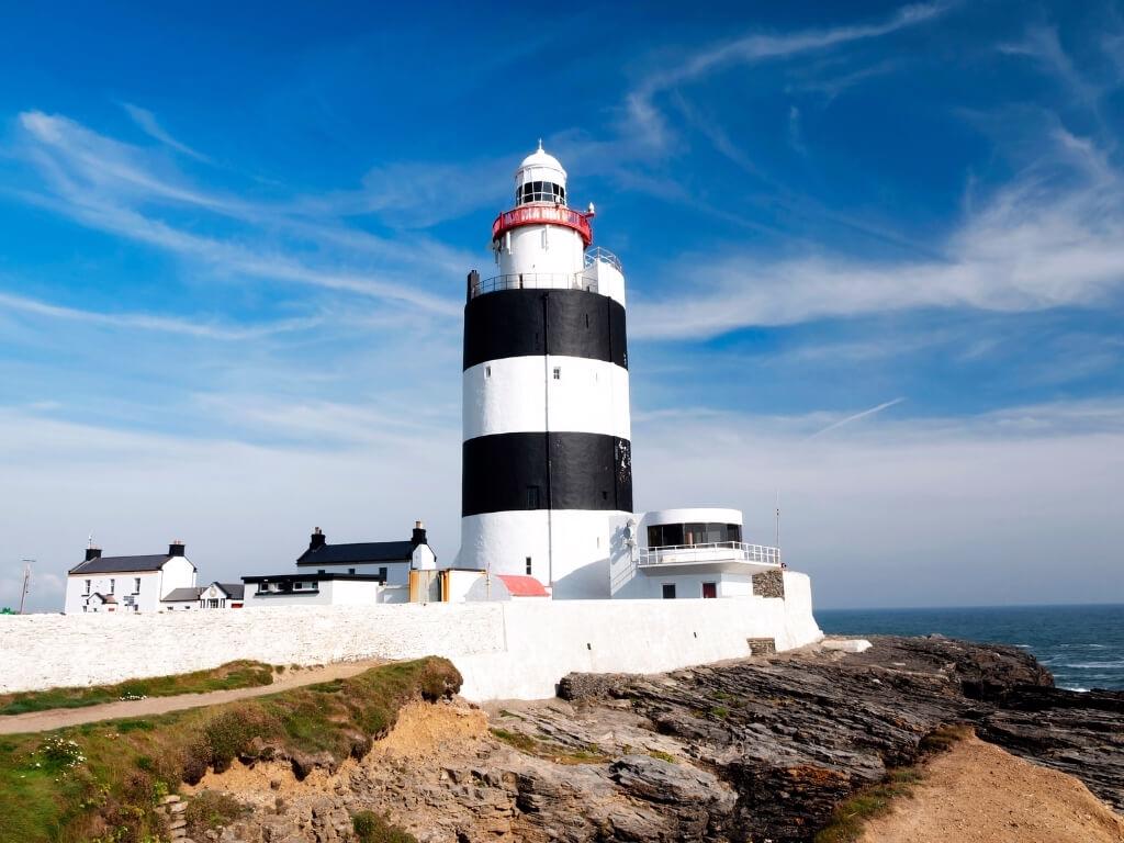 A picture of the Hook Head Lighthouse with blue skies overhead