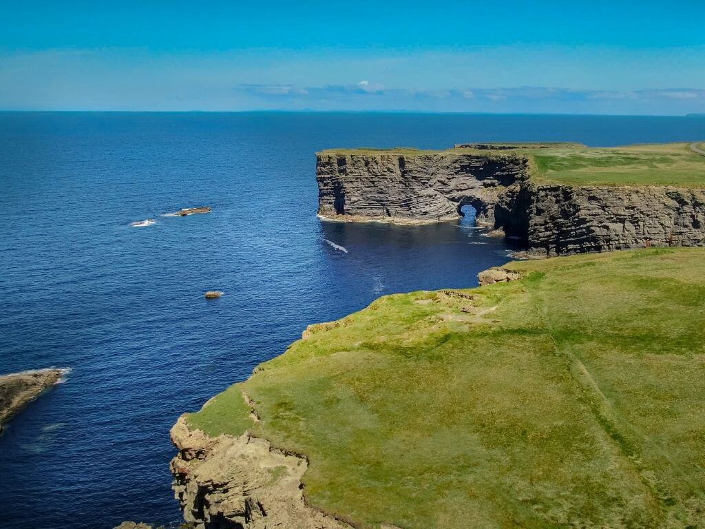 A picture of the coastline along the Kilkee Cliffs in County Clare that can be visited along the Wild Atlantic Way, Ireland