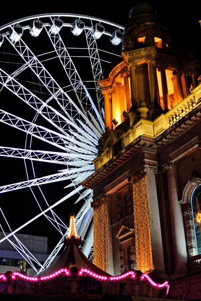 A picture of Belfast City Hall and Christmas Ferris Wheel