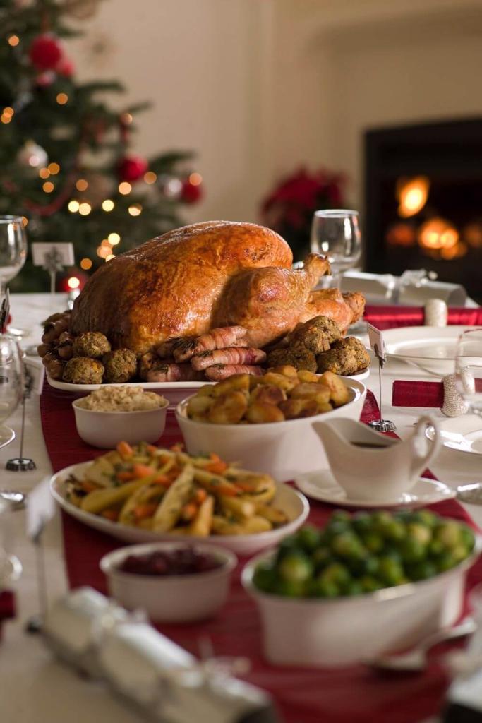 A picture of a Traditional Irish Christmas Dinner with roast turkey, roast potatoes and more