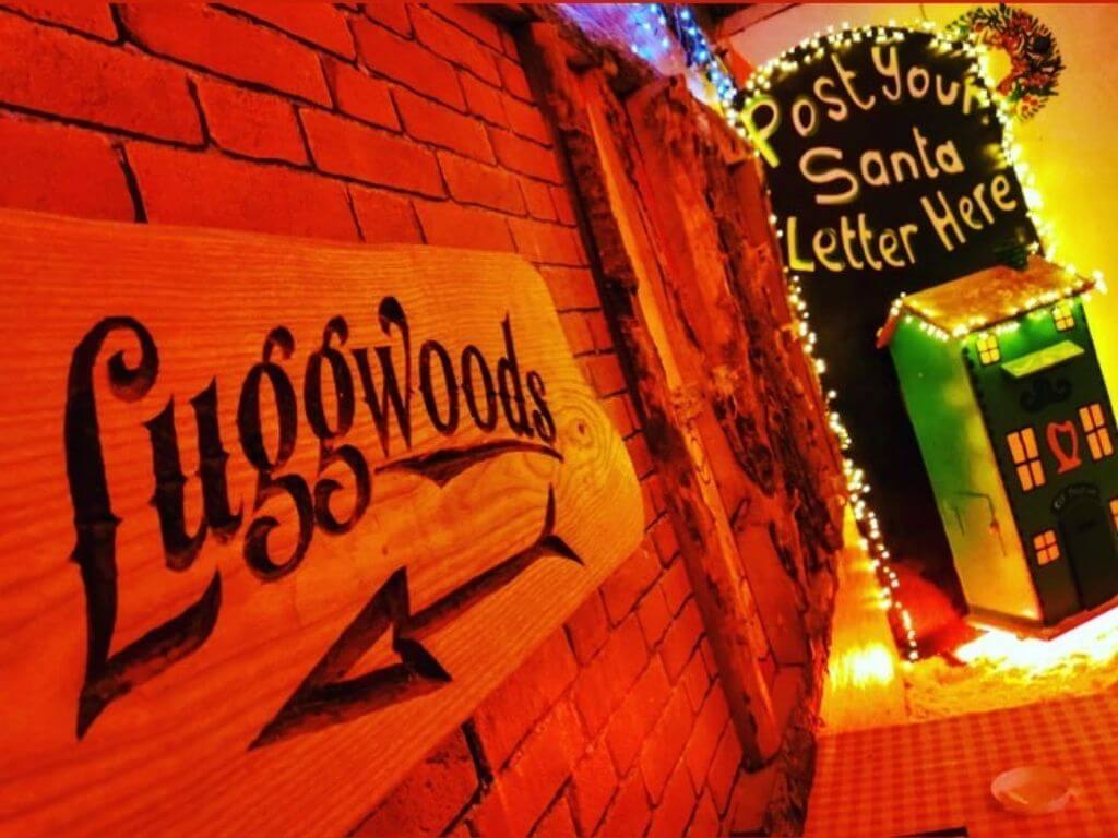 A picture of a post box and sign at the Christmas experience at Luggwoods