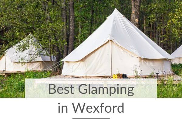 A picture of some glamping bell tents in a wood with text overlay saying best glamping in wexford