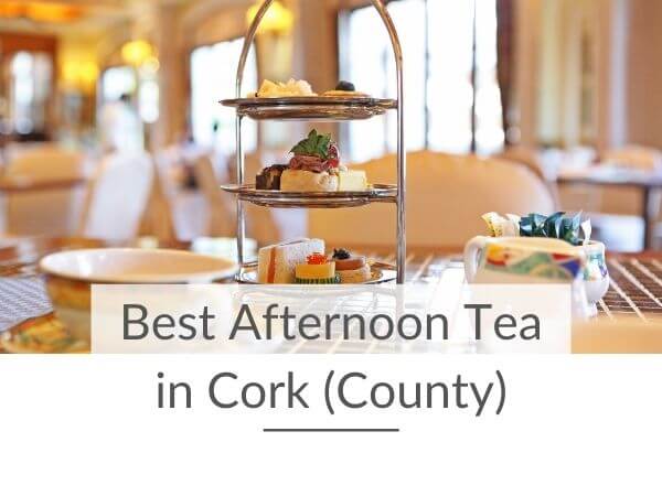 A picture of a three-tiered afternoon tea tray on a table with text overlay saying best afternoon tea in Cork (County)
