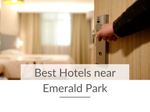 A picture of a hotel room door being opened and text overlay saying best hotels near Emerald Park