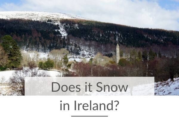 A picture of Glendalough during winter surrounded by snow and text overlay saying Does it Snow in Ireland?