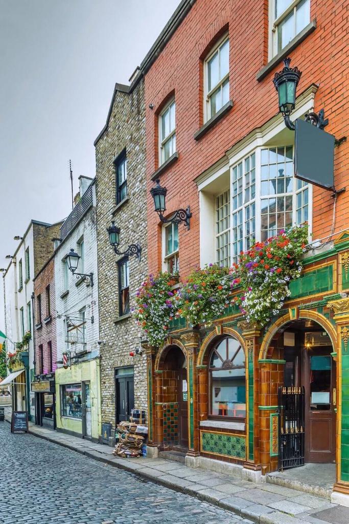 A picture of a street lined with pubs in Temple Bar Dublin
