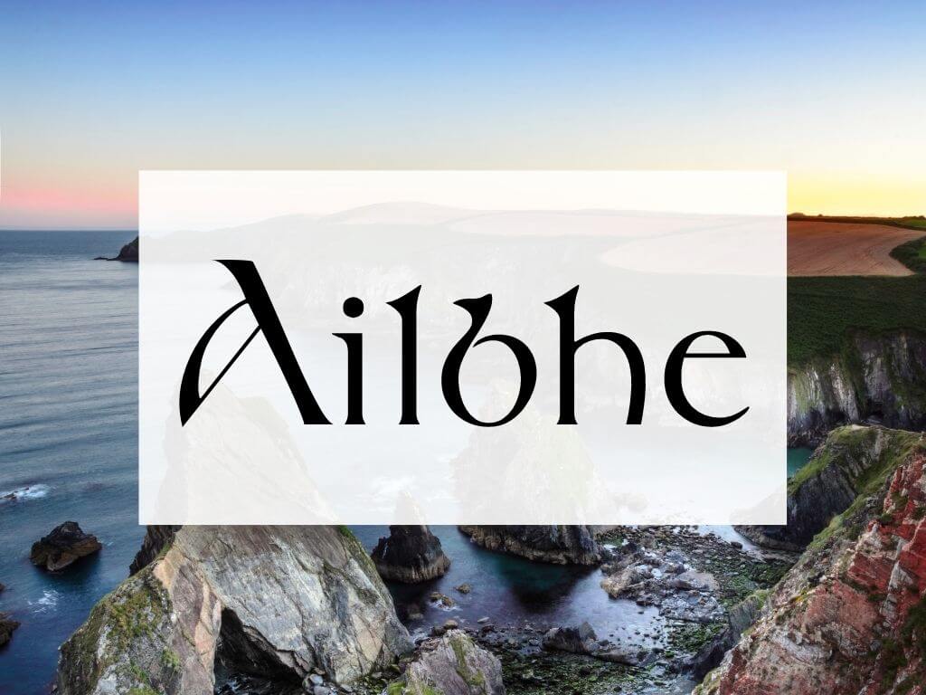 A picture of a rocky Irish coastline and a textbox over it containing the word Ailbhe