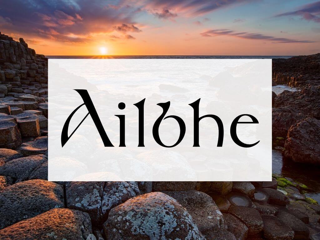 A picture of sunset at the Giant's Causeway, text box over it with the word Ailbhe
