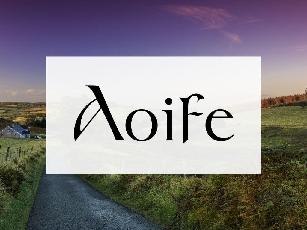 A picture of a country lane road between green fields and a purple sky overhead, with a textbox containing the name Aoife