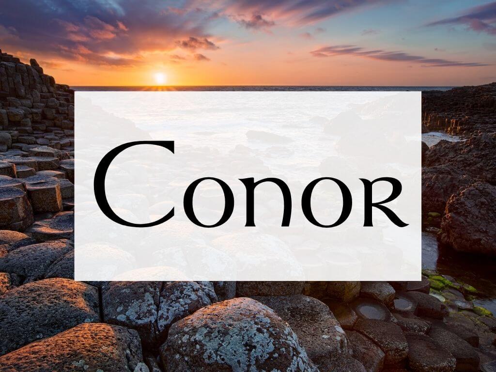 A picture of sunset over the Giants Causeway with a textbox containing the Irish word Conor