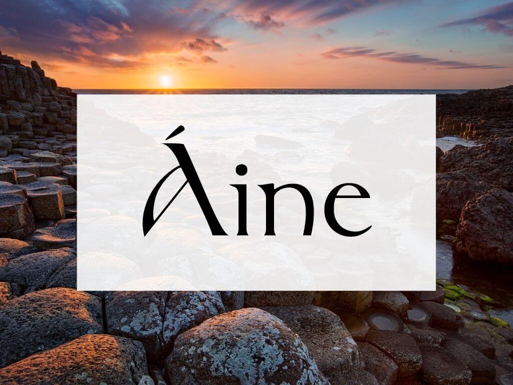 A picture of sunset at the Giant's Causeway, text box over it with the word Aine