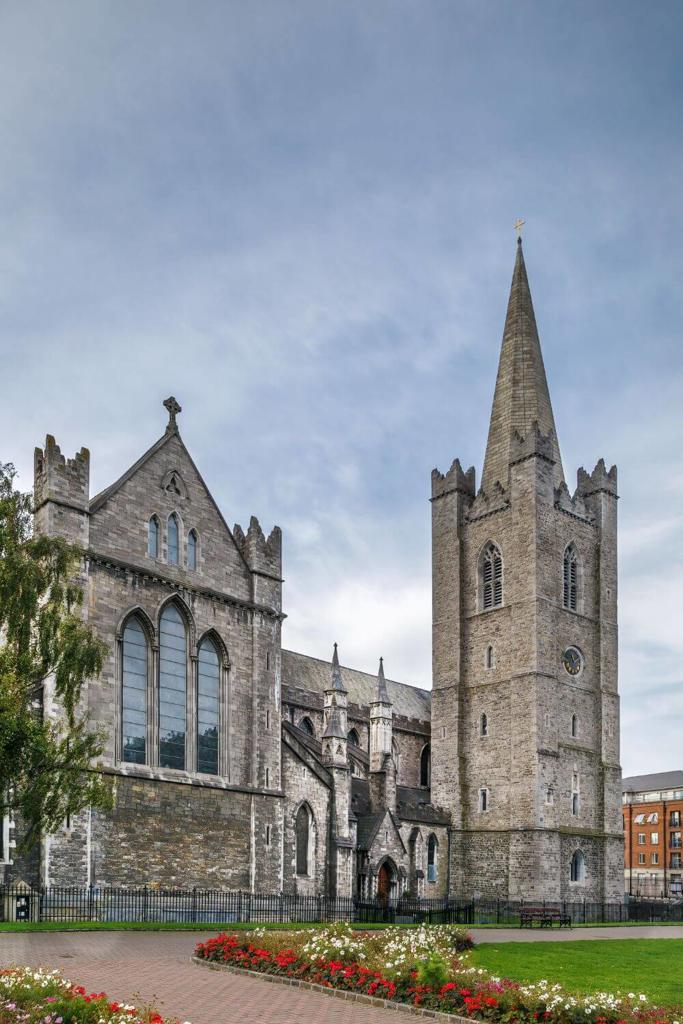 A picture of the outside of St Patrick's Cathedral, Dublin with blue skies overhead