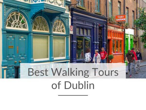 A picture of people passing a pub on a street in Dublin with text overlay in a white box at the bottom saying best walking tours of Dublin