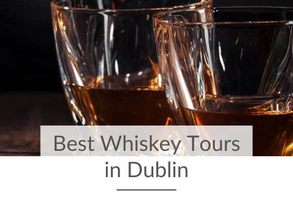 A picture of two glasses standing side by side against a dark background, containing Irish whiskey and text overlay saying Best Whiskey Tours in Dublin