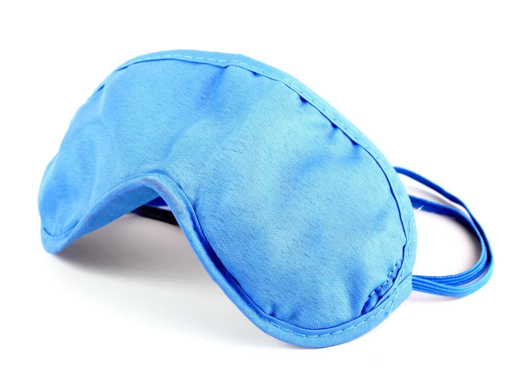 A picture of a blue sleeping eye mask