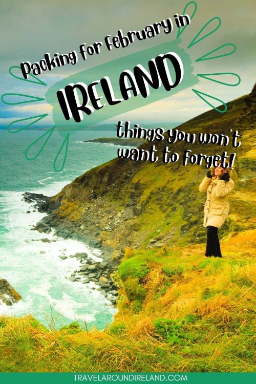 A picture of a lady in a beige winter coat standing on a grassy bank at tyhe edge of a coastline and text overlay saying packing for February in Ireland, things you won't want to forget!