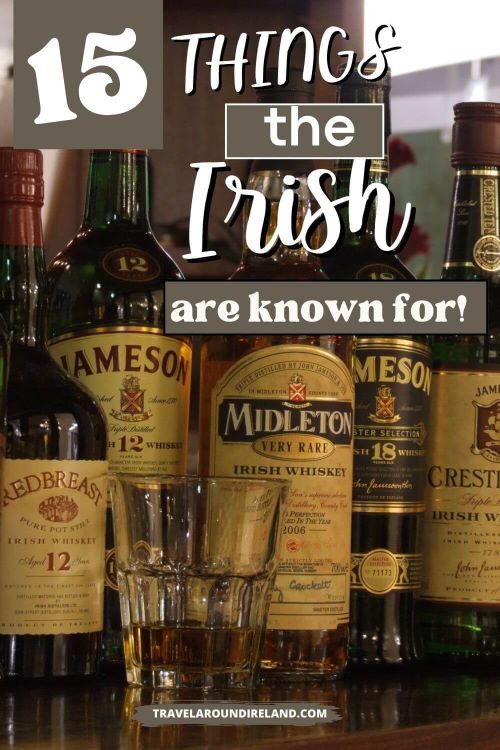 A picture of whiskey bottles standing on a bar with a glass in front containing a meadure of whiskey and test overlay saying 15 things the Irish are known for