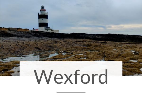 A picture of the Hook Head Lighthouse in County Wexford with text overlay underneath saying Wexford
