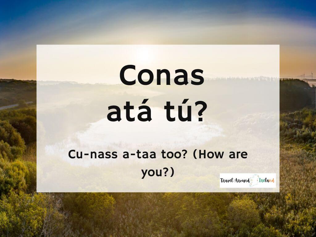 A picture of a sunrise and text overlay saying Conas atá tú?