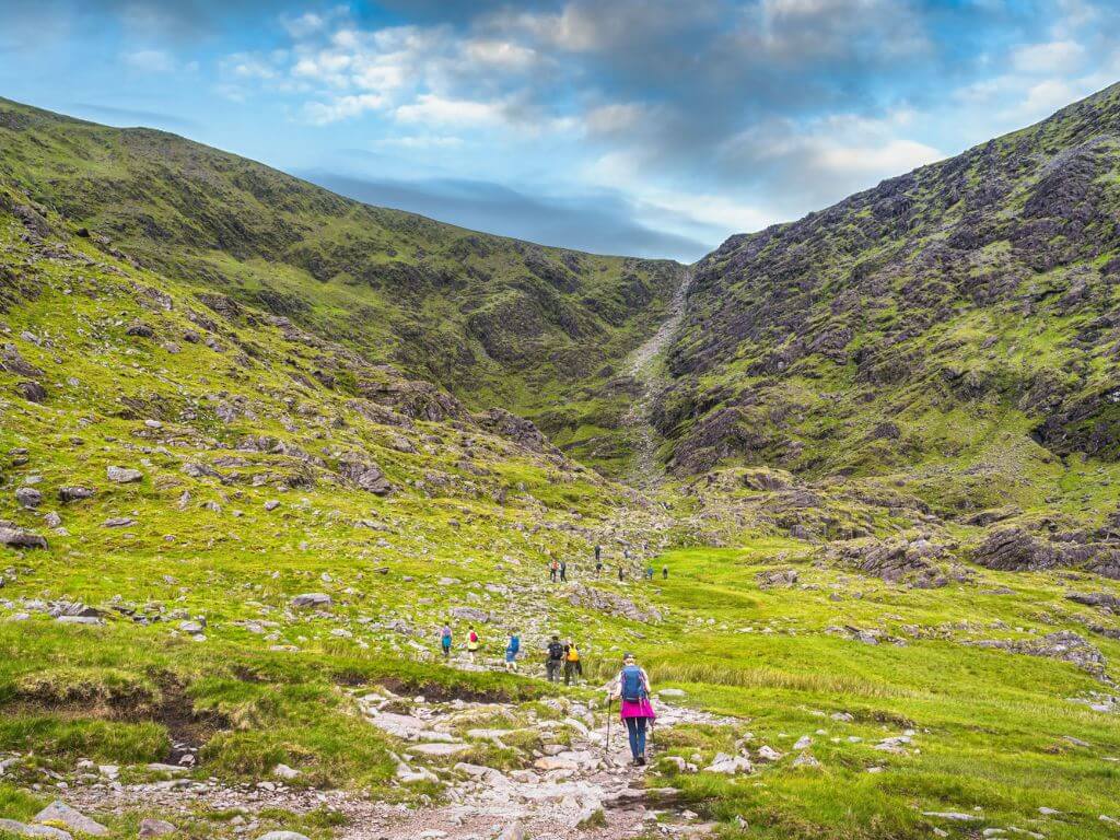 A picture of people hiking Carrauntoohil in County Kerry