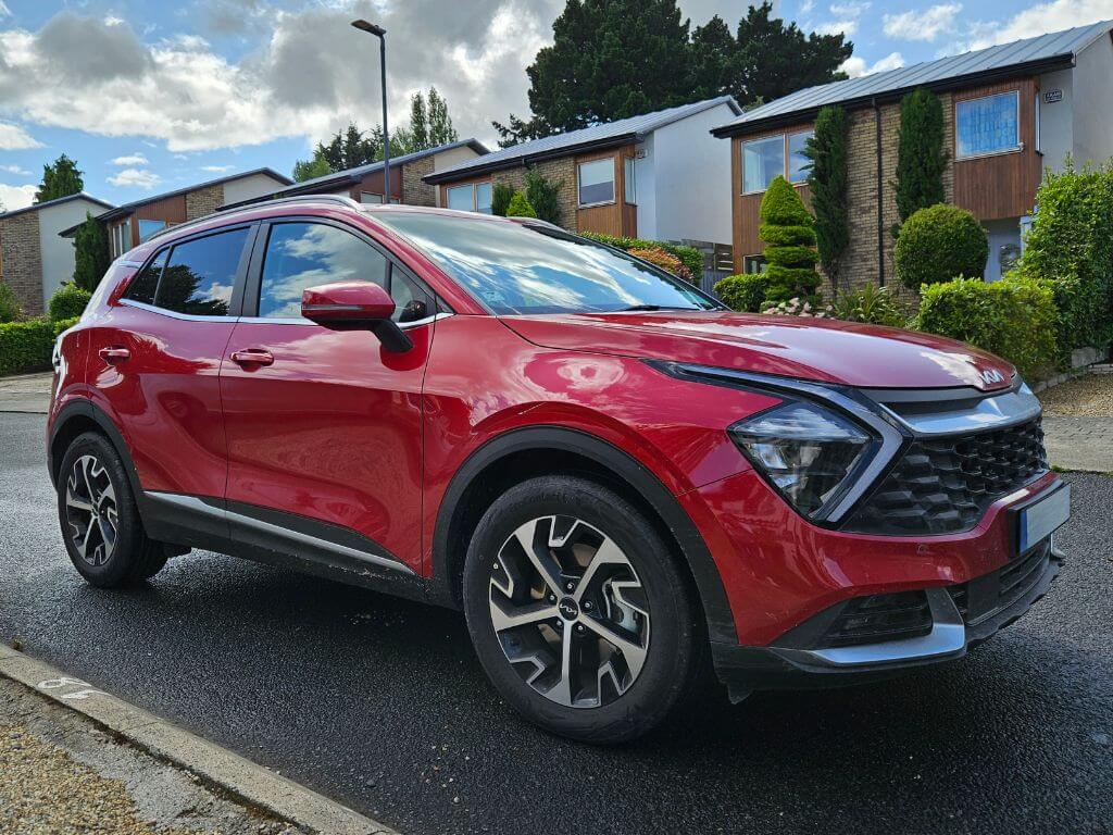 A picture of the front of a Kia Sportage rented through My Irish Cousin, an independent car rental company in Ireland.