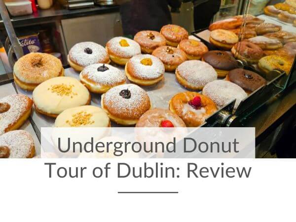 A picture of a counter containing an array of donuts and text overlay saying underground donut tour of Dublin review