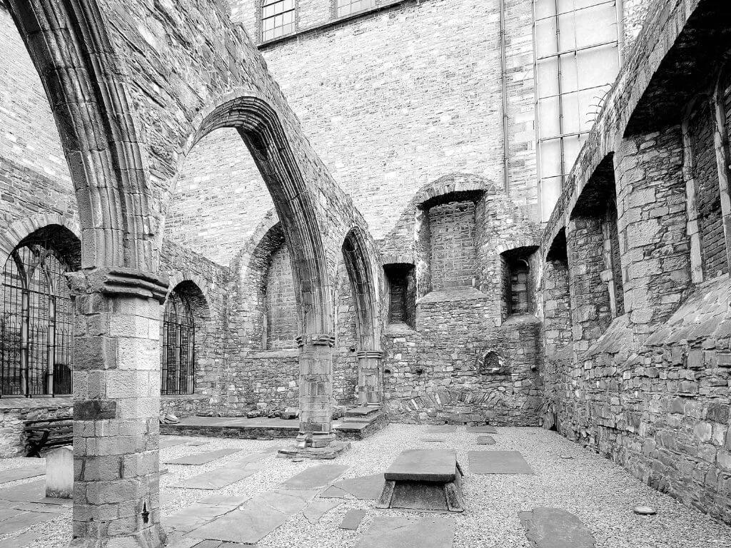 A black and white picture of the inside of St Audoen's Church in Dublin.