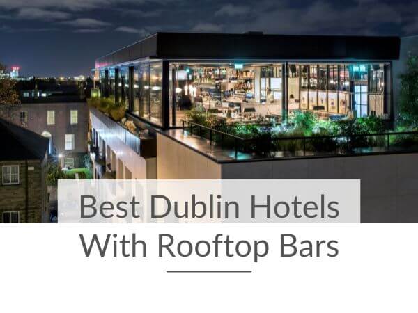 A picture of the rooftop bar of Layla's at The Devlin Hotel in Dublin by night and text in a box underneath saying best Dublin hotel with rooftop bars.