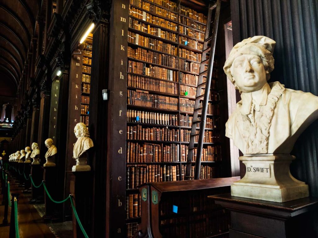 A picture of some of the bookcases and marble busts in the Old Library in Trinity College, Dublin.