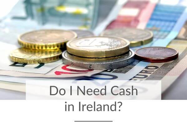 A close up picture of euro coins and notes on a table and text overlay along the bottom saying do I need cash in Ireland?