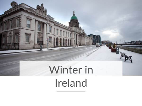 A picture of the Four Courts in Dublin, Ireland with snow on the ground and text overlay underneath saying winter in Ireland.